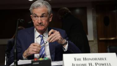 Fed prevé tres aumentos de tasas de interés en 2022
