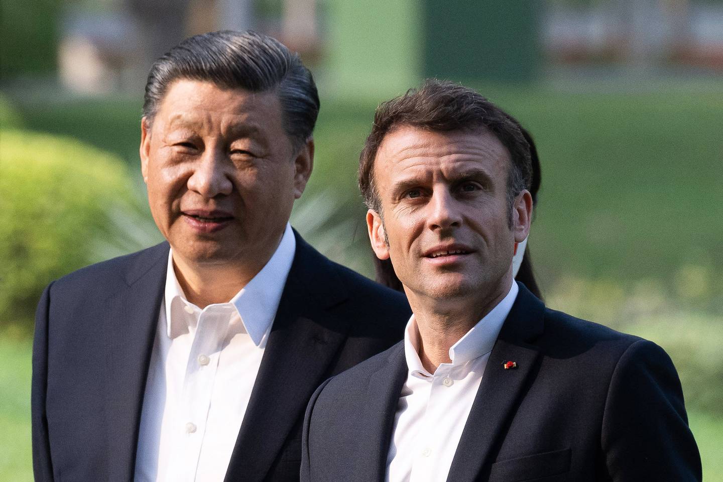 Xi Jinping (i) y Emmanuel Macron. AFP