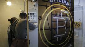 El bitcoin alcanzó los $18.000  en su debut en el mercado de futuros