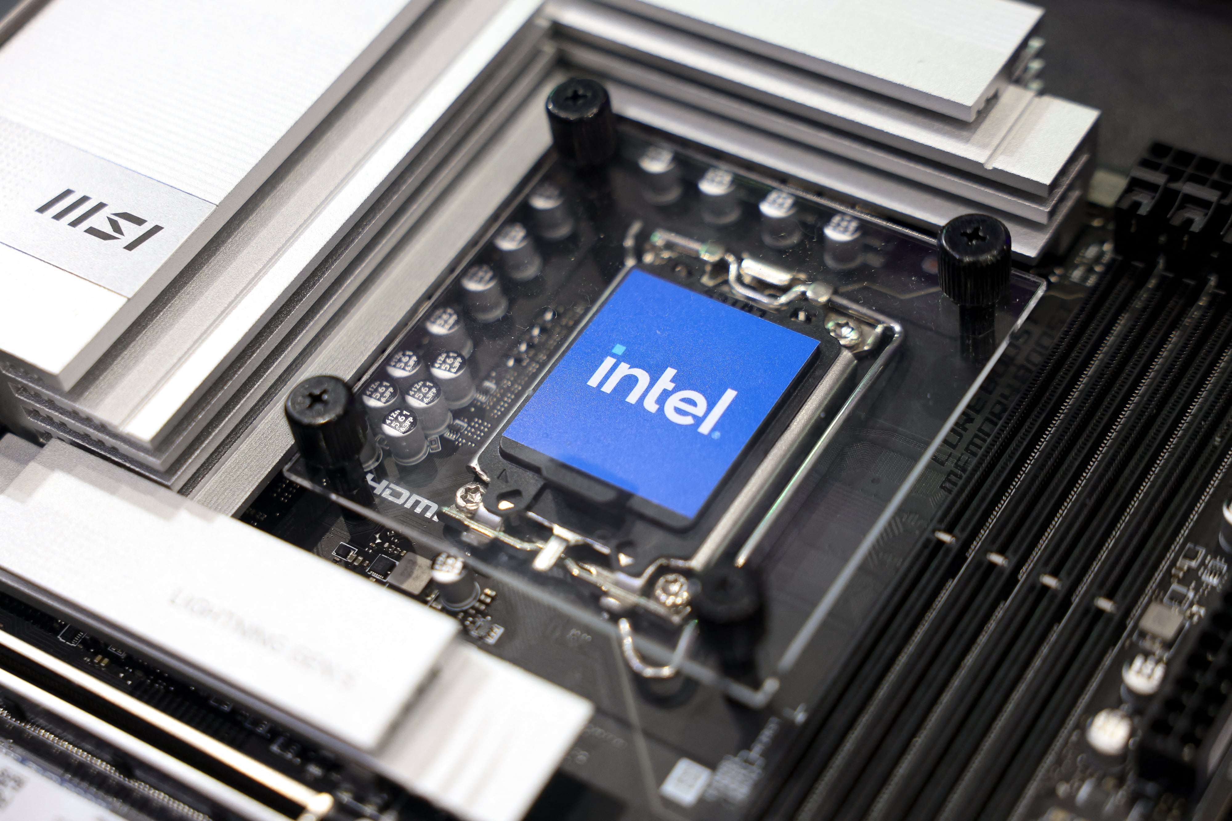 The sample of an Intel chip is displayed during Computex 2024 in Taipei on June 4, 2024. (Photo by I-Hwa CHENG / AFP)