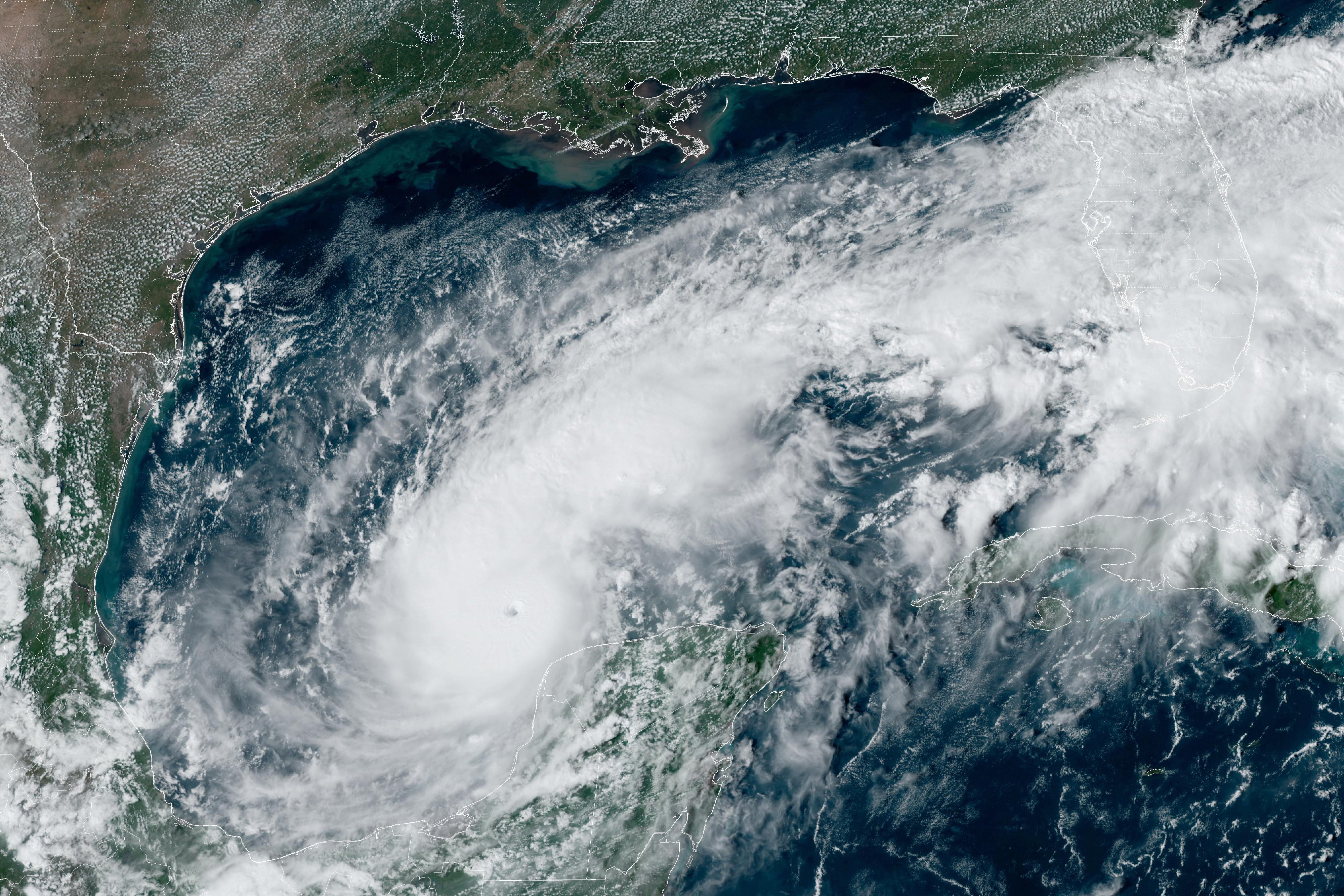 This handout satellite image courtesy of the National Oceanic and Atmospheric Administration (NOAA) and the Regional and Mesoscale Meteorology Branch (RAMMB) shows hurricane Milton churning over the Gulf of Mexico on October 7, 2024. - Hurricane Milton exploded in strength Monday to become a potentially catastrophic Category 5 storm bound for Florida, threatening the US state with a second ferocious hurricane in as many weeks. (Photo by HANDOUT / NOAA / AFP) / RESTRICTED TO EDITORIAL USE - MANDATORY CREDIT "AFP PHOTO / NOAA / RAMMB" - NO MARKETING NO ADVERTISING CAMPAIGNS - DISTRIBUTED AS A SERVICE TO CLIENTS