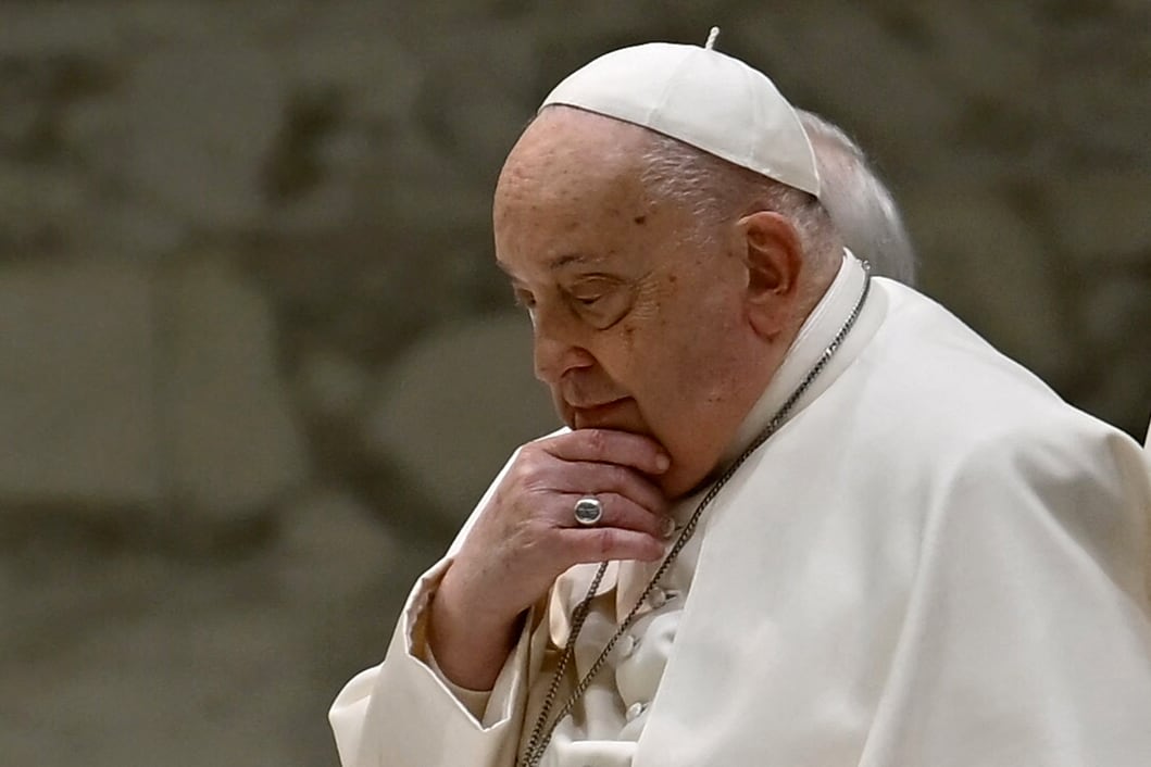 (FILES) Pope Francis attends the weekly general audience on February 12, 2025 at Paul-VI hall in The Vatican. Pope Francis passes another calm night in hospital, the Vatican said on February 21, 2025 in its morning update, as the 88-year-old spent his seventh day in hospital being treated for pneumonia. (Photo by Filippo MONTEFORTE / AFP)