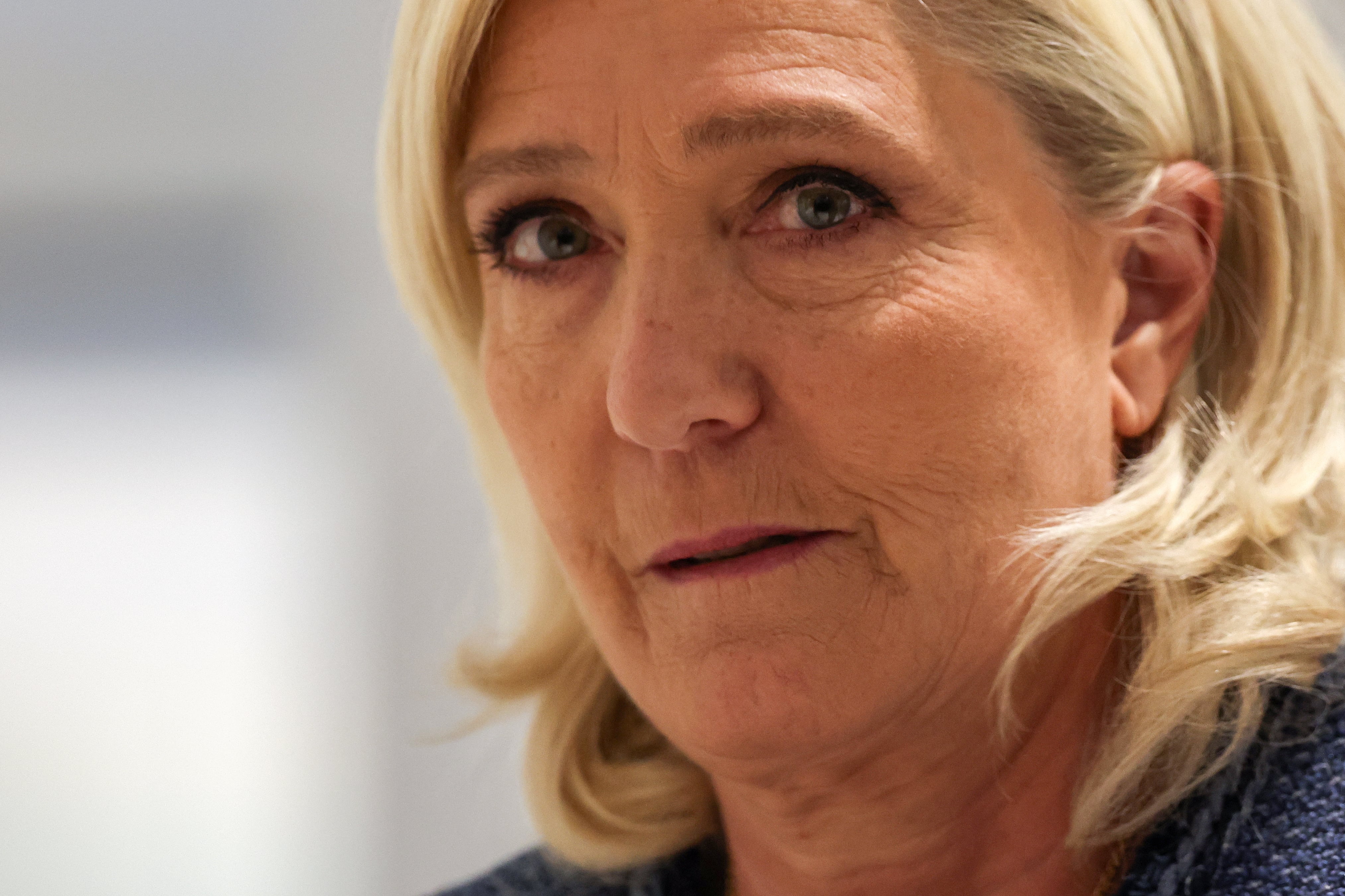 President of the parliamentary group of the French far-right Rassemblement National (RN) party, Marine Le Pen arrives at the Paris courthouse for her trial verdict on suspicion of embezzlement of European public funds, in Paris, on March 31, 2025. A French court sentenced on March 31, 2025 far-right leader Marine Le Pen to a five-year ban on running for office with immediate effect, throwing into doubt her bid to stand for President in 2027. (Photo by Alain JOCARD / AFP)
