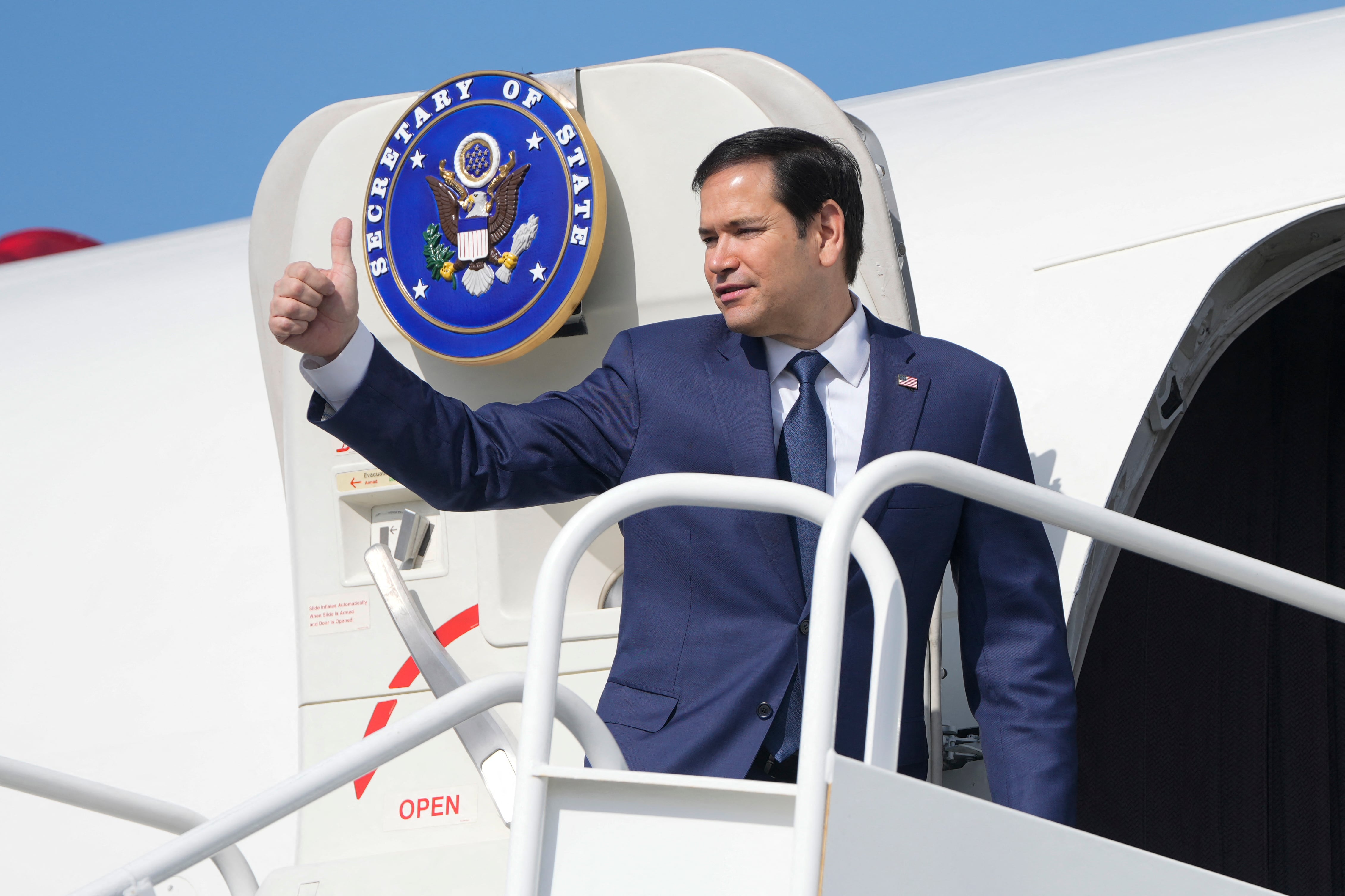 US Secretary of State Marco Rubio boards a plane en route to El Salvador at Panama Pacifico International Airport in Panama City on February 3, 2025. Rubio is in Panama on a two-day official visit. (Photo by Mark Schiefelbein / Pool AP / AFP)