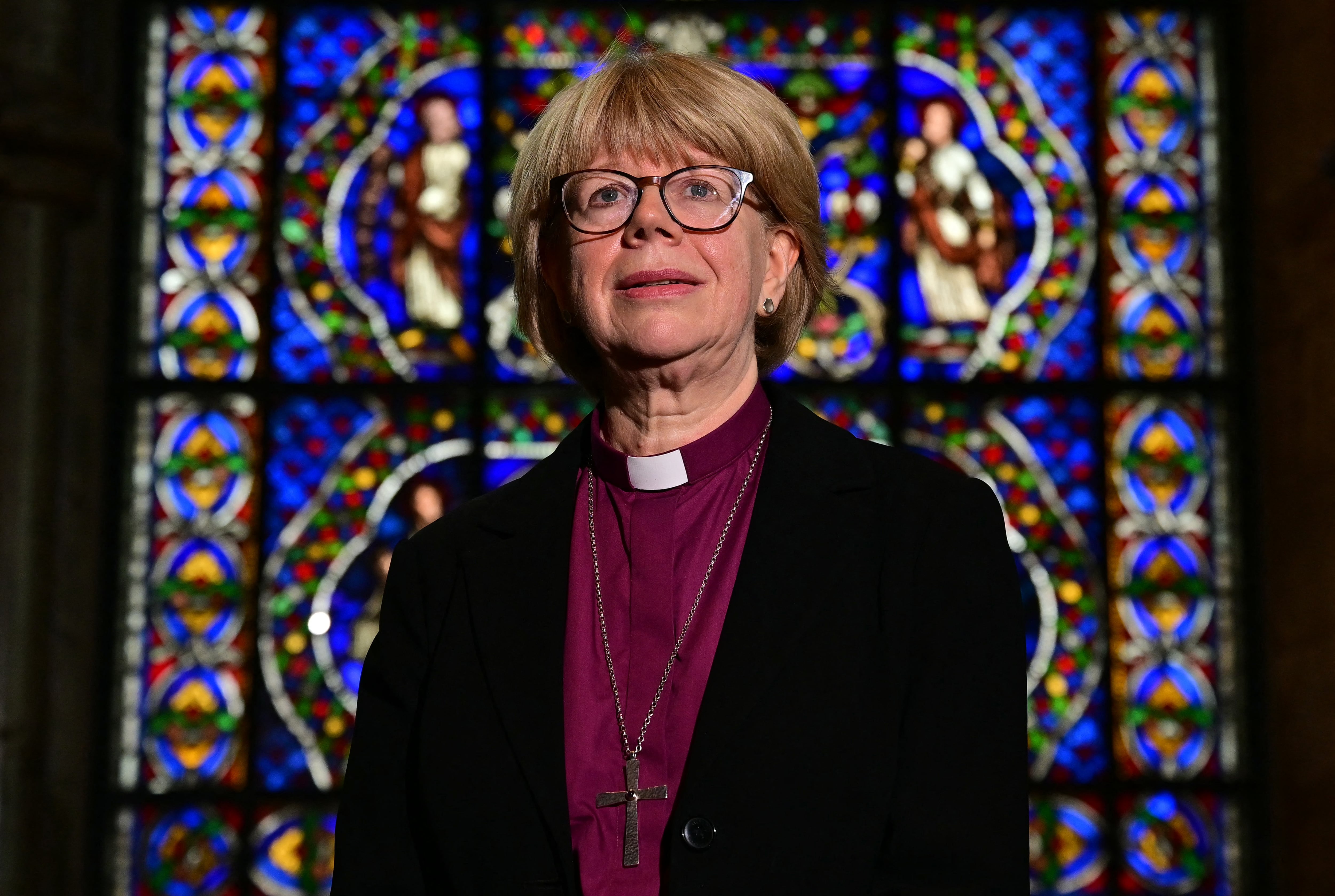 Britain's new Archbishop of Canterbury-designate, Sarah Mullally, poses for a photograph in The Corona Chapel at Canterbury Cathedral, south east England on October 3, 2025, following the announcement of her posting. Sarah Mullally was on Friday named the new Archbishop of Canterbury, the UK government announced, becoming the first woman to lead the Church of England in its history. Her nomination by a committee tasked with finding a successor to Justin Welby, who stepped down earlier this year over an abuse scandal, has been approved by King Charles III, the government said. (Photo by Ben STANSALL / AFP)