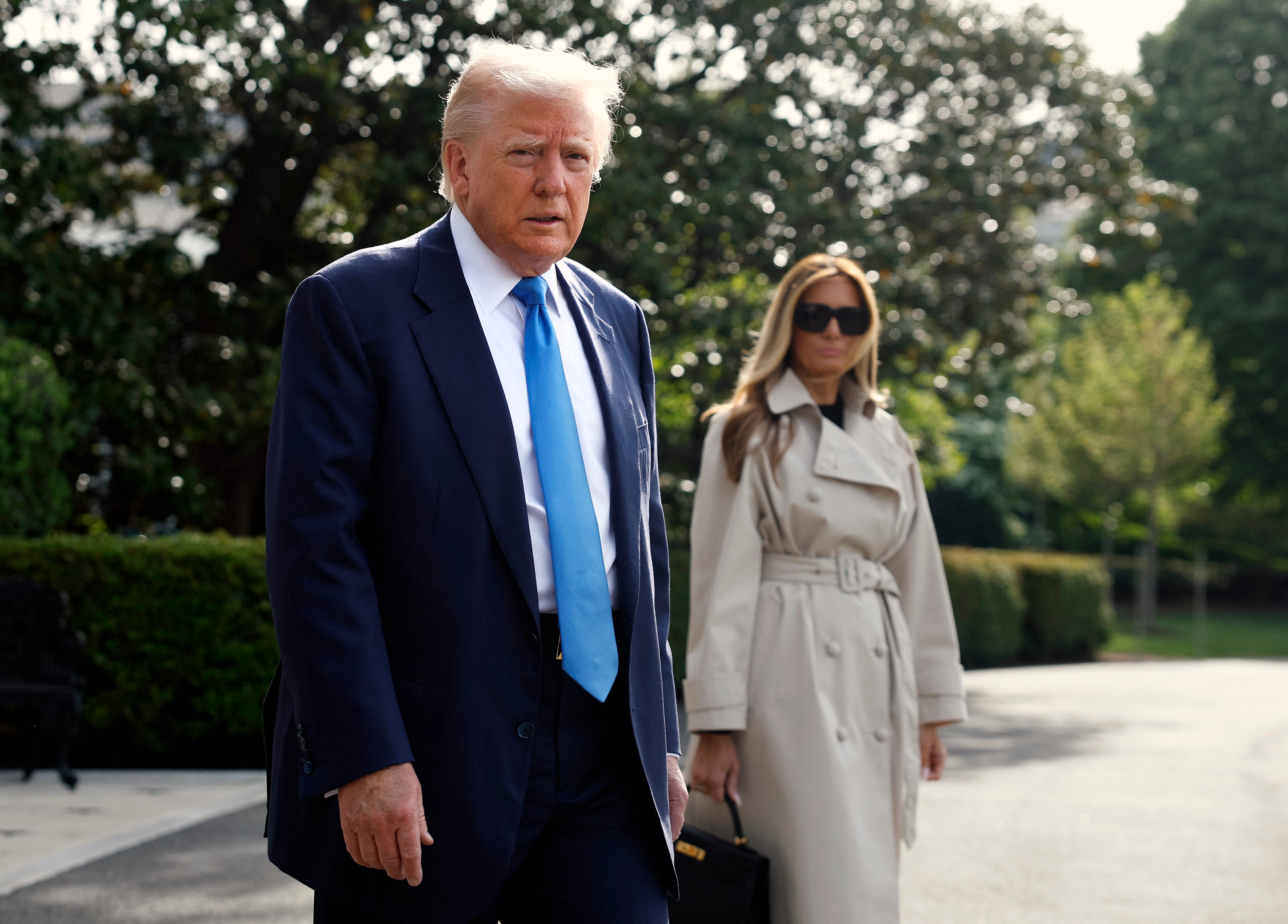 WASHINGTON, DC - APRIL 25: U.S. President Donald Trump and first lady Melania Trump depart the White House on April 25, 2025 in Washington, DC. President Trump and the first lady are traveling to Rome to attend the funeral of Pope Francis.   Kevin Dietsch/Getty Images/AFP (Photo by Kevin Dietsch / GETTY IMAGES NORTH AMERICA / Getty Images via AFP)