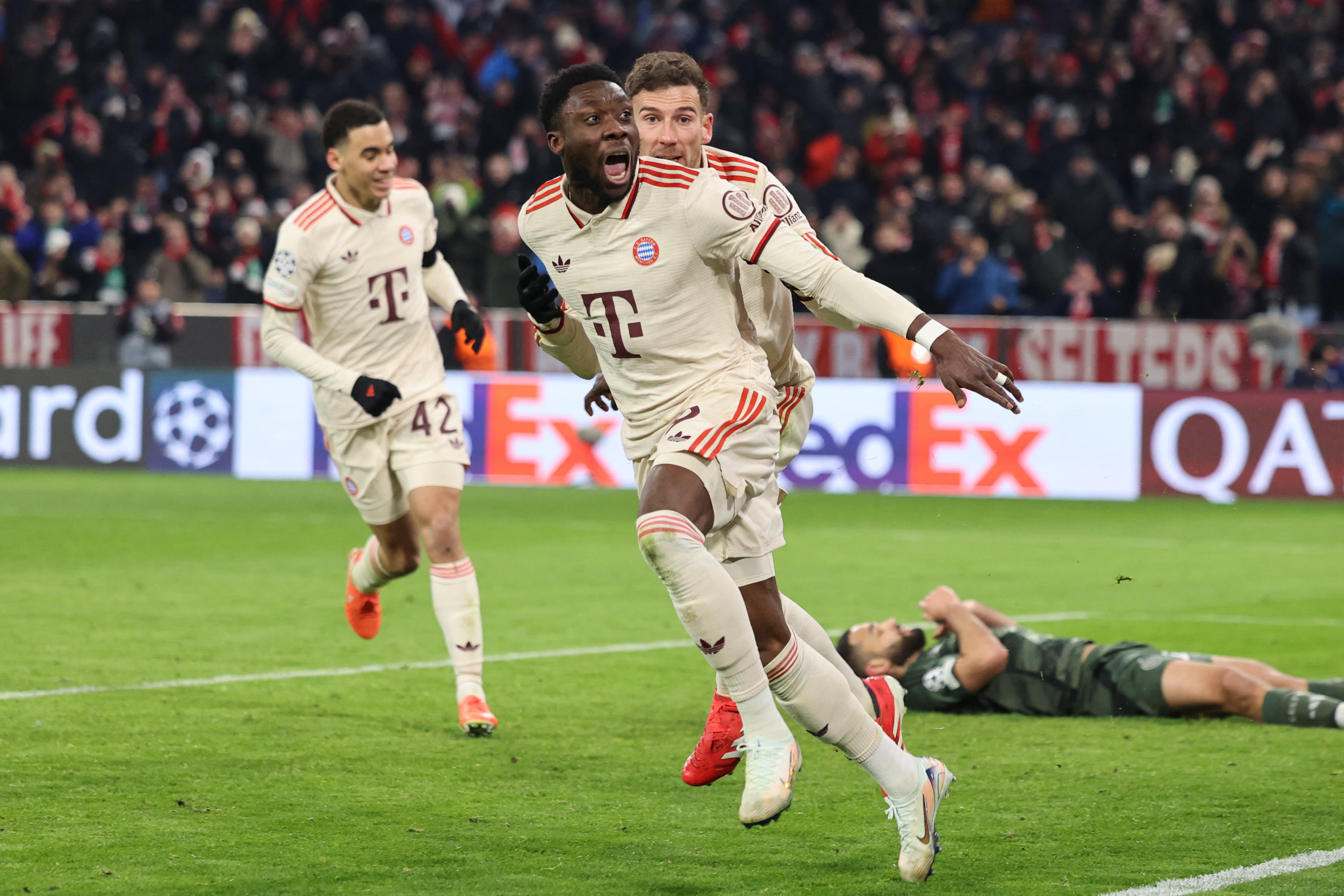 Bayern Munich's Canadian defender #19 Alphonso Davies celebrates after scoring the equalising goal during the UEFA Champions League second-leg, knockout phase play-off match FC Bayern Munich vs Celtic on February 18, 2025 in Munich. (Photo by Alexandra BEIER / AFP)