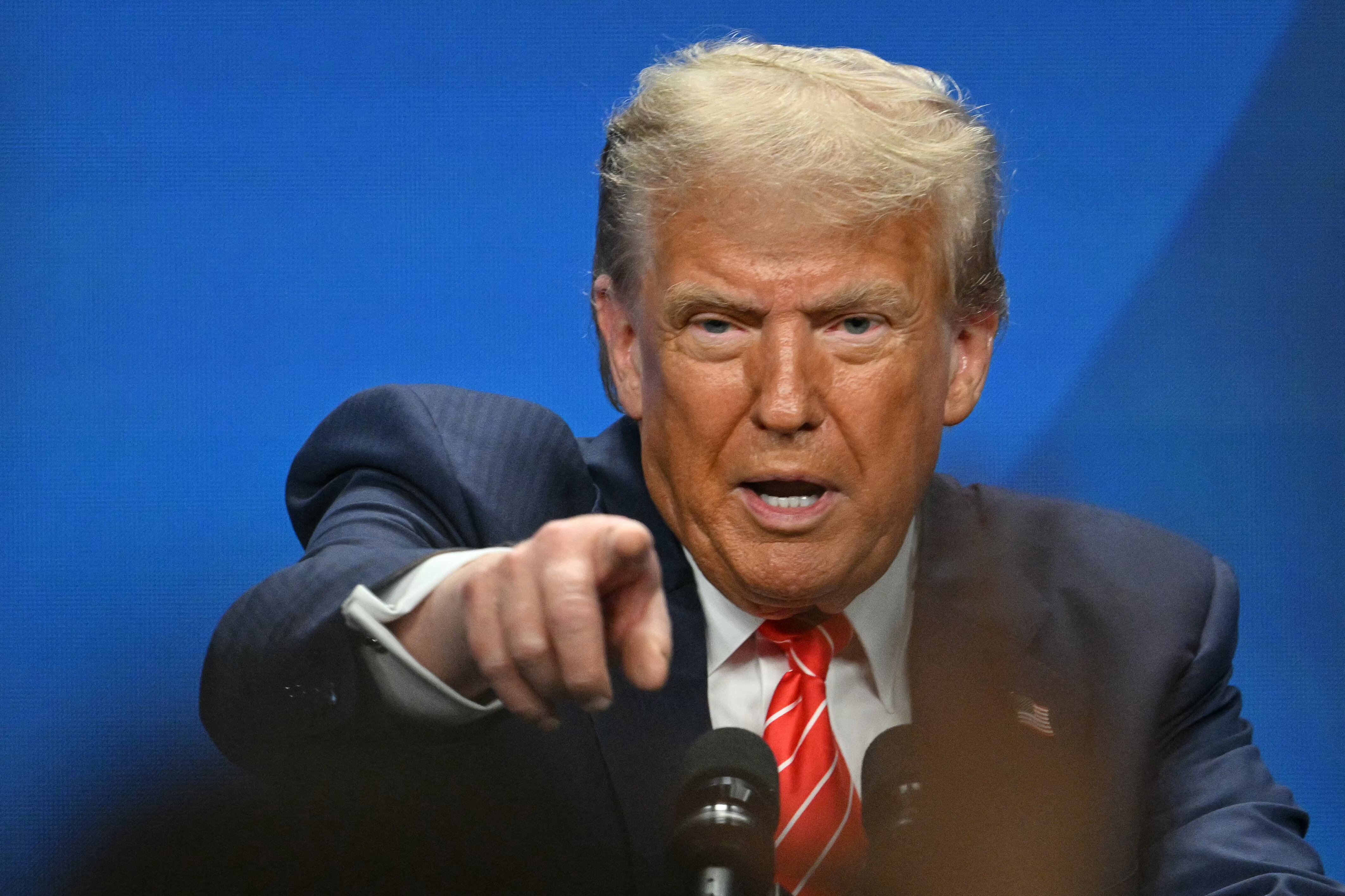 US President Donald Trump addresses a press conference during a North Atlantic Treaty Organization (NATO) Heads of State and Government summit in The Hague on June 25, 2025. (Photo by NICOLAS TUCAT / AFP)